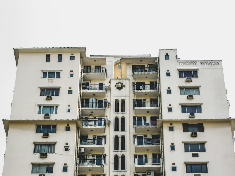 Furnished 2 BHK near DLF Phase 1 Market – apartment building exterior, representative image